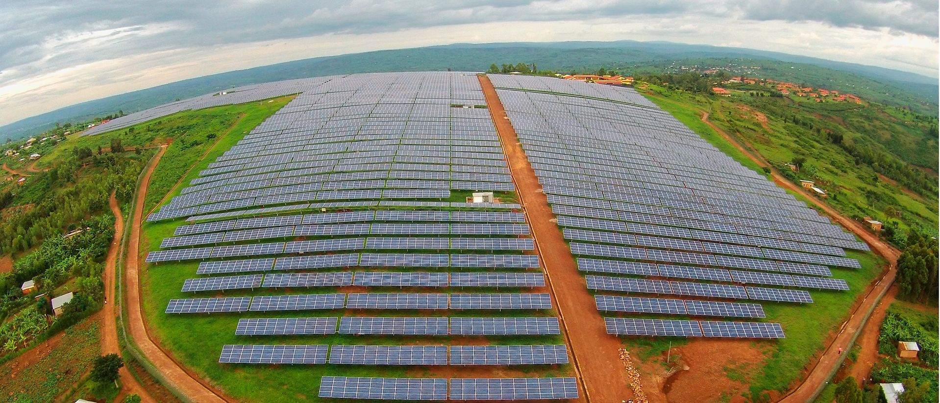 Field full of solar panels.