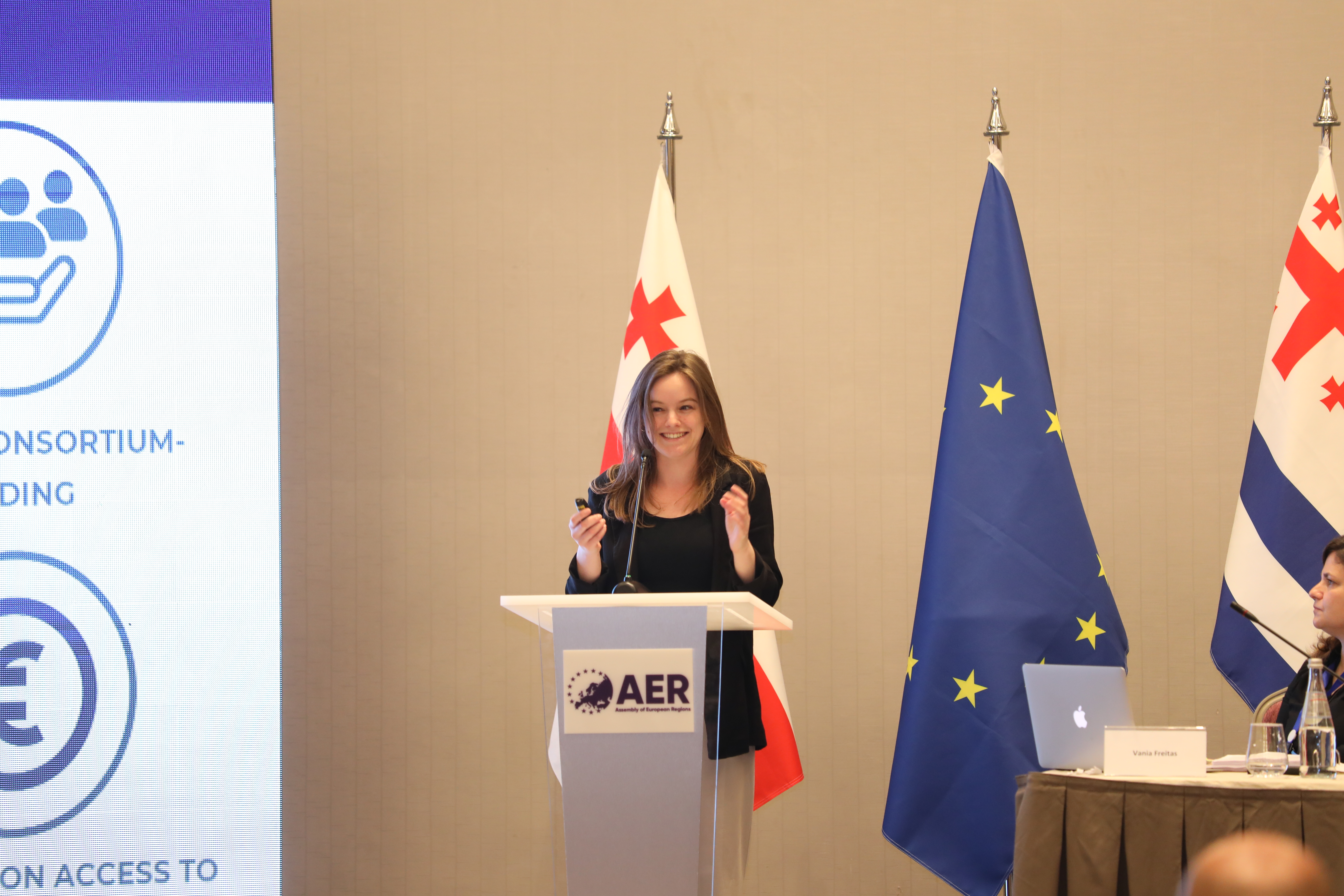 Woman speaking in a conference room